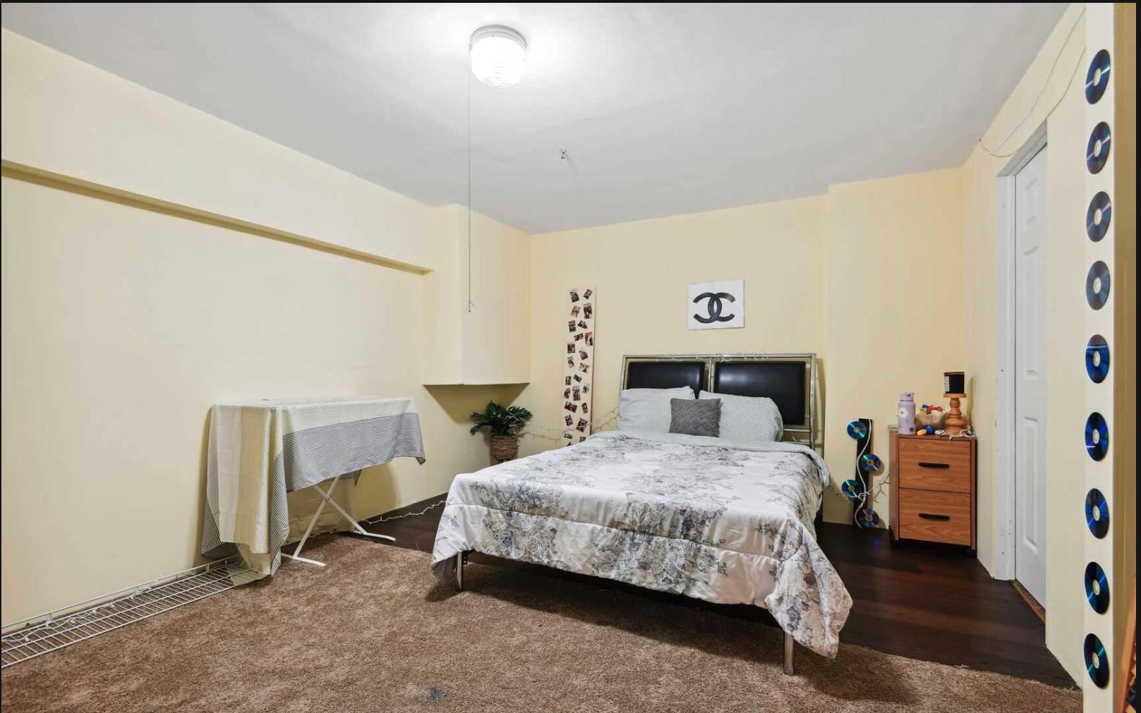 1272 Paddington Road Mahwah, NJ 07430 - Photo 13 of 15 a bedroom with a bed and a table in it