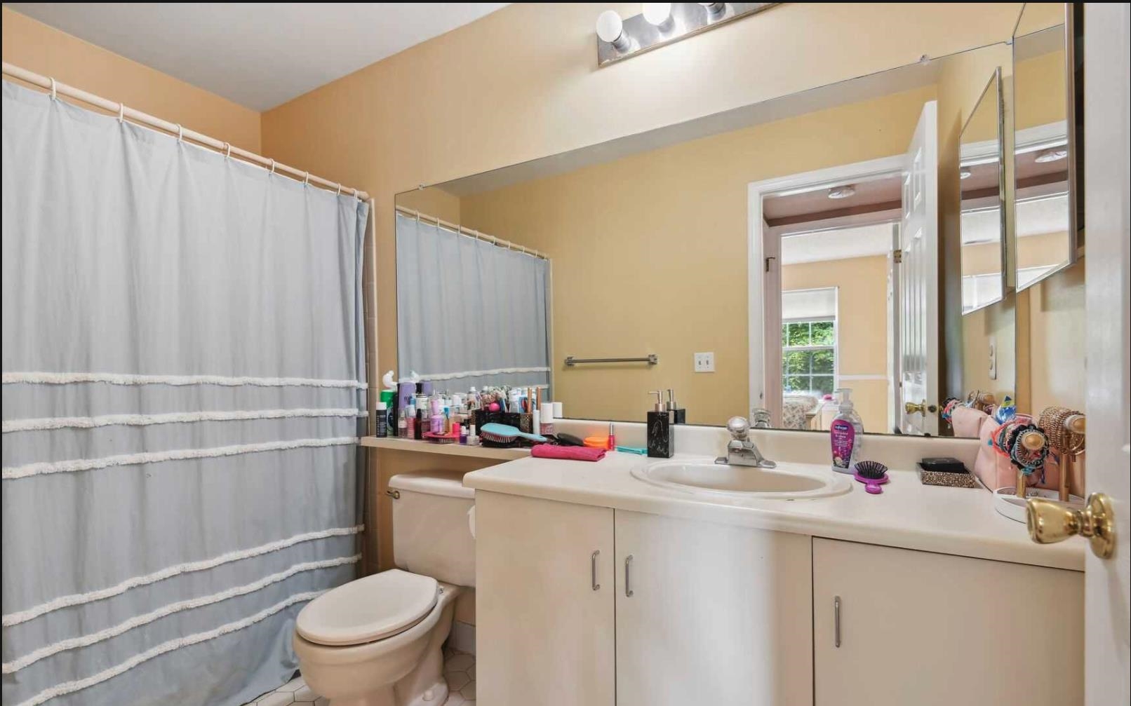 1272 Paddington Road Mahwah, NJ 07430 - Photo 14 of 15 a bathroom with a sink vanity mirror and toilet