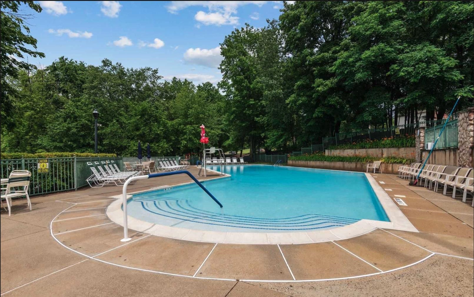 1272 Paddington Road Mahwah, NJ 07430 - Photo 15 of 15 a view of a swimming pool with a patio