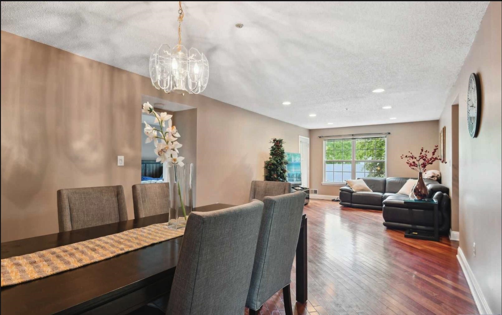 1272 Paddington Road Mahwah, NJ 07430 - Photo 4 of 15 a living room with furniture and a chandelier