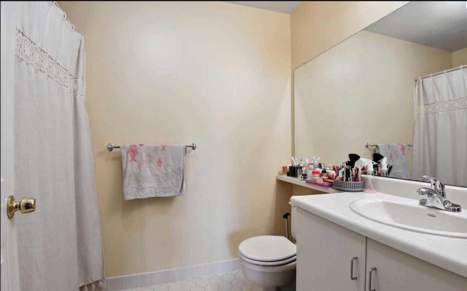 1272 Paddington Road Mahwah, NJ 07430 - Photo 9 of 15 a bathroom with a sink toilet and mirror