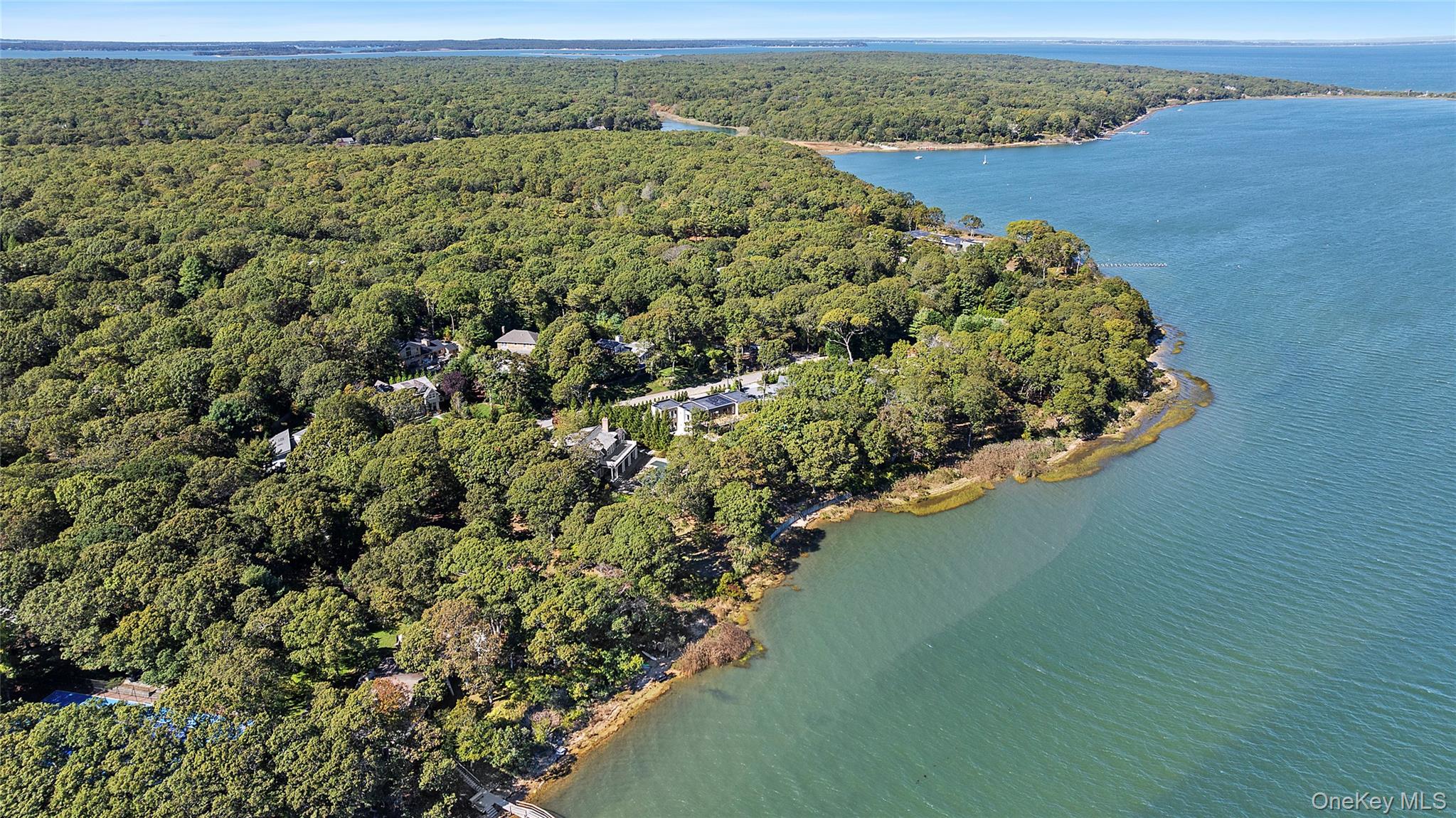 35 Springwood Way East Hampton, NY 11937 - Photo 1 of 26 an aerial view of a house with a yard