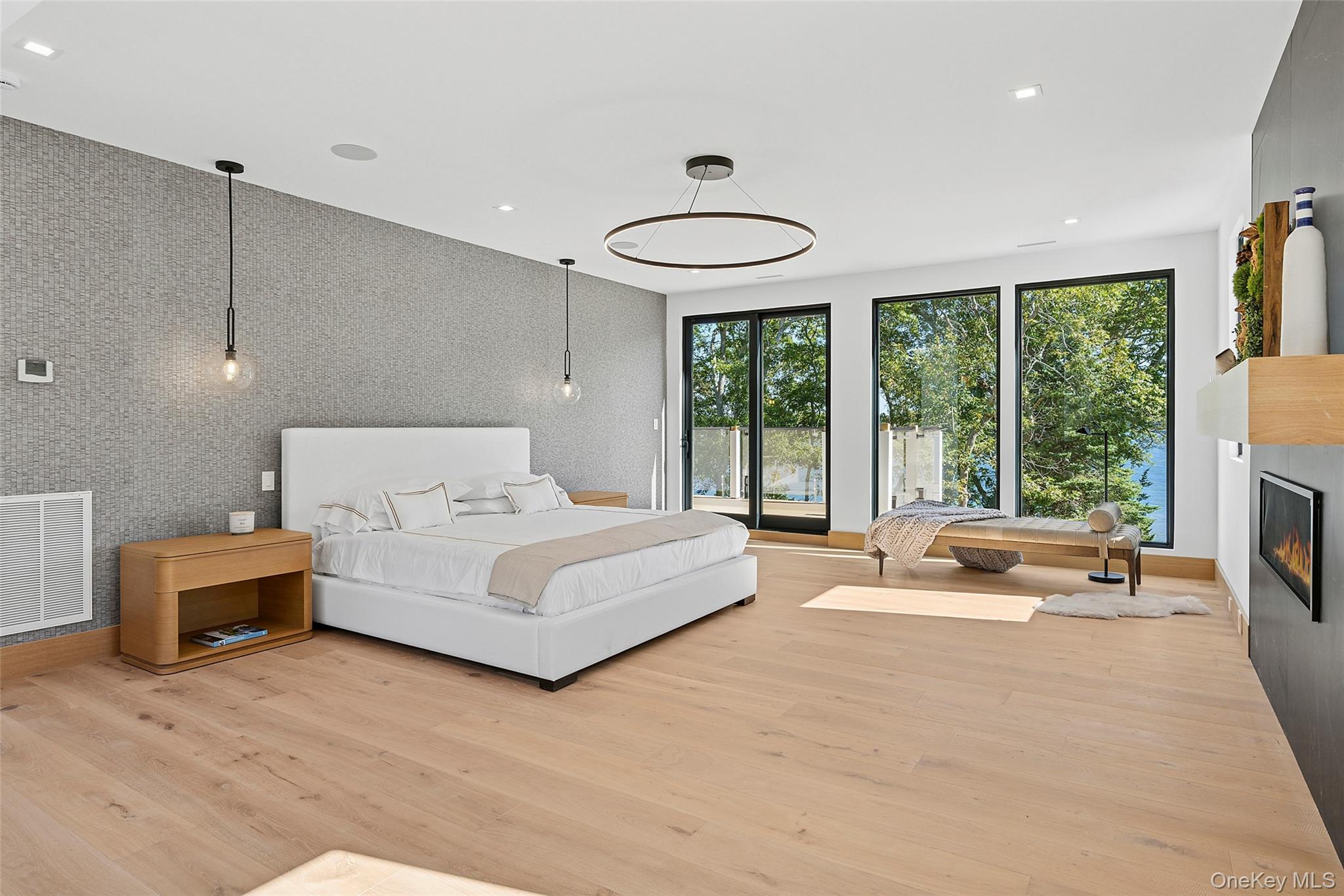 35 Springwood Way East Hampton, NY 11937 - Photo 19 of 26 a living room with furniture and a large window