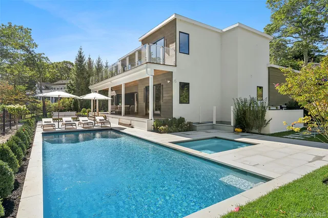 a front view of a house with swimming pool