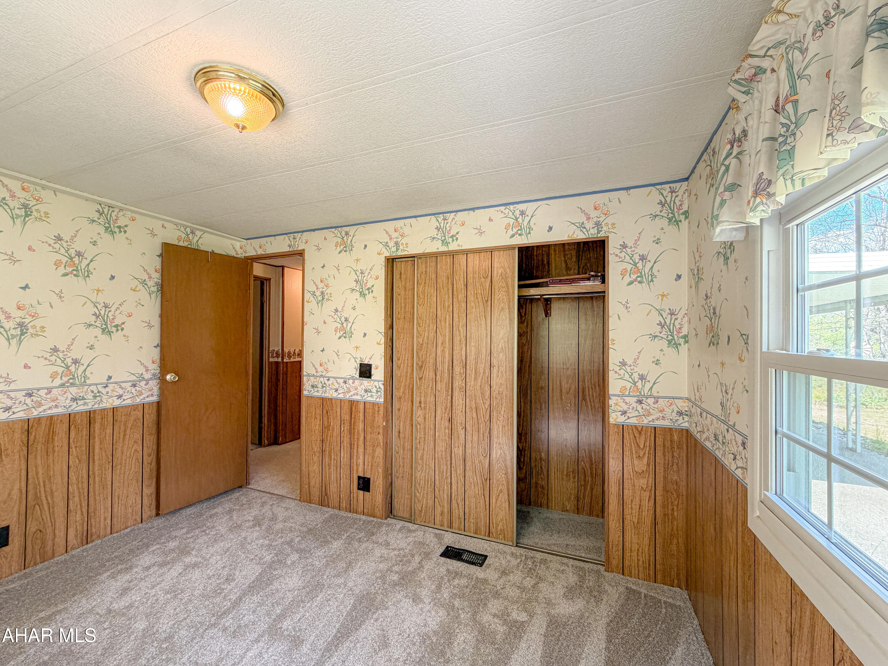 151 Pine Echo Road Everett, PA 15537 - Photo 29 of 51 a view of a hallway with windows