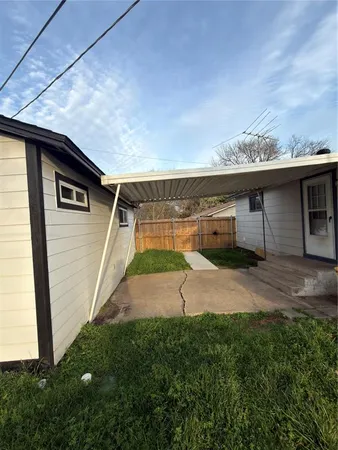 a house view with a backyard space