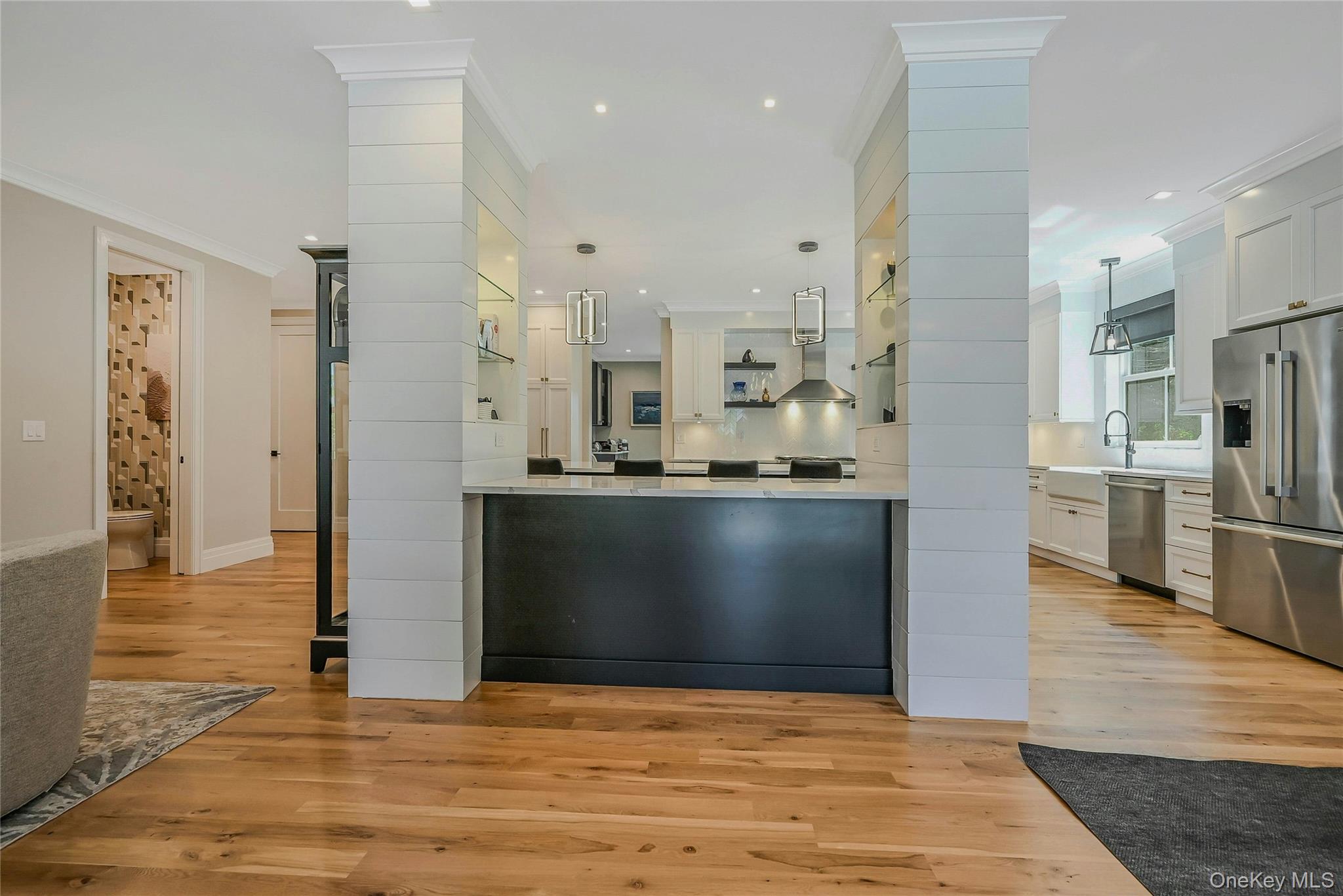 1665 Glenn Road Southold, NY 11971 - Photo 34 of 34 a view of a kitchen with stainless steel appliances granite countertop a refrigerator and a sink