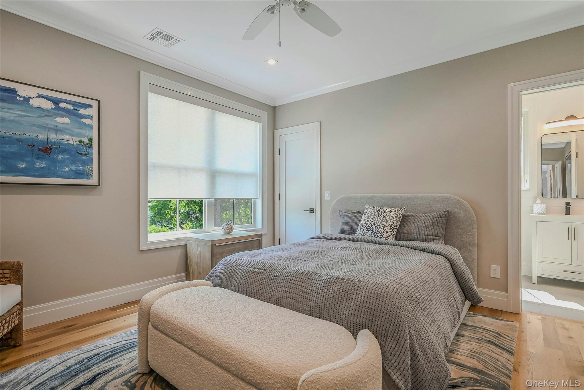 1665 Glenn Road Southold, NY 11971 - Photo 24 of 34 a room with a bed and a window