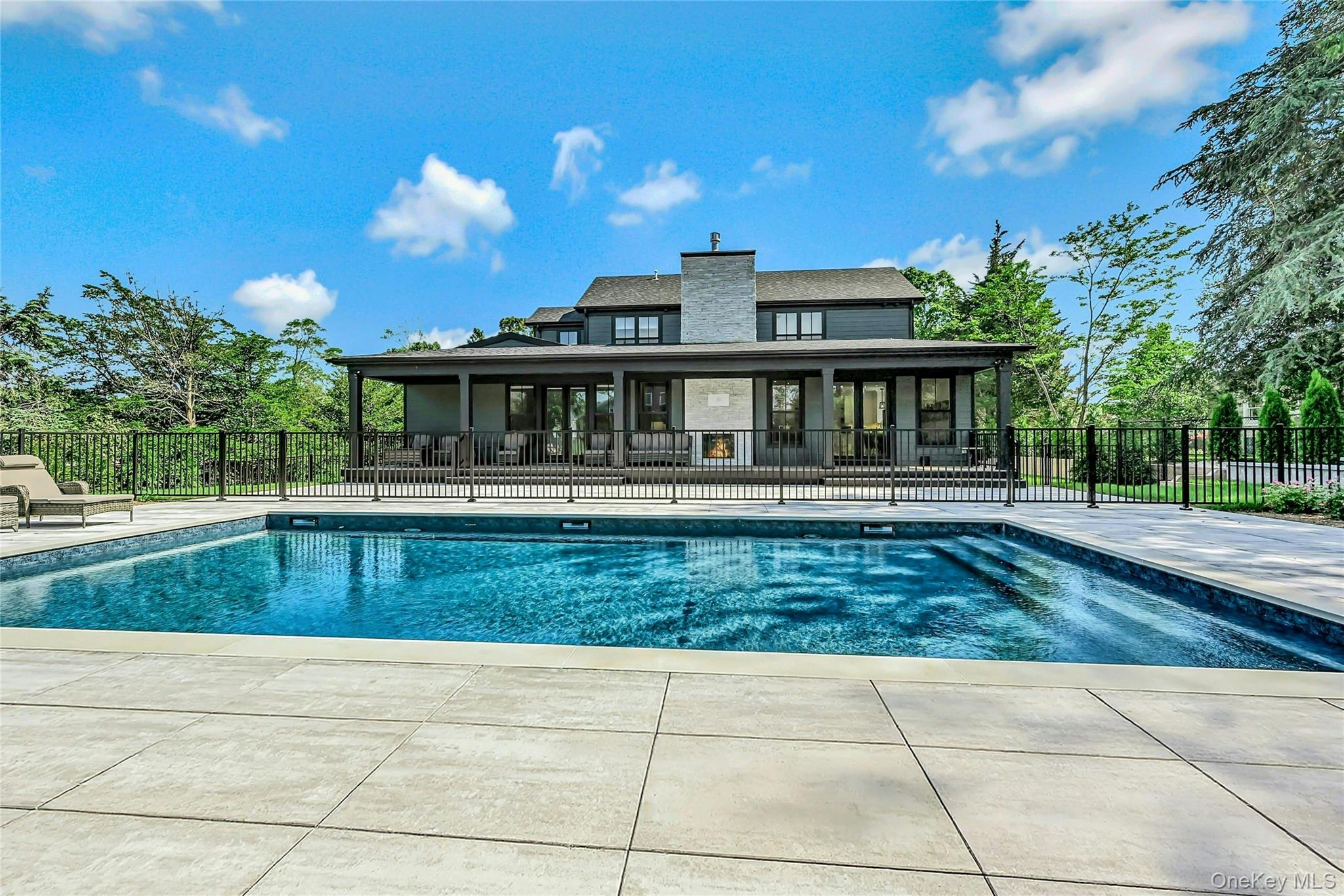 1665 Glenn Road Southold, NY 11971 - Photo 31 of 34 a view of house with a swimming pool