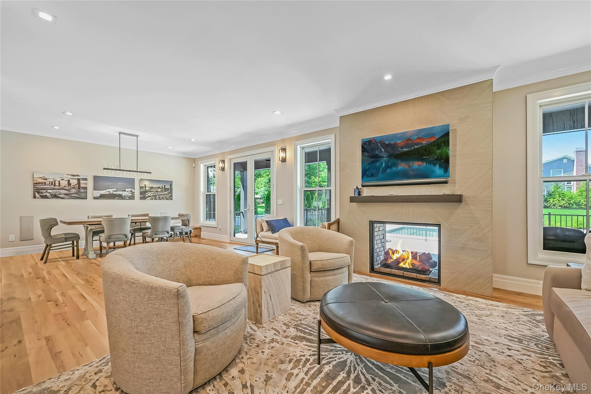 1665 Glenn Road Southold, NY 11971 - Photo 5 of 34 a living room with fireplace furniture and a fireplace