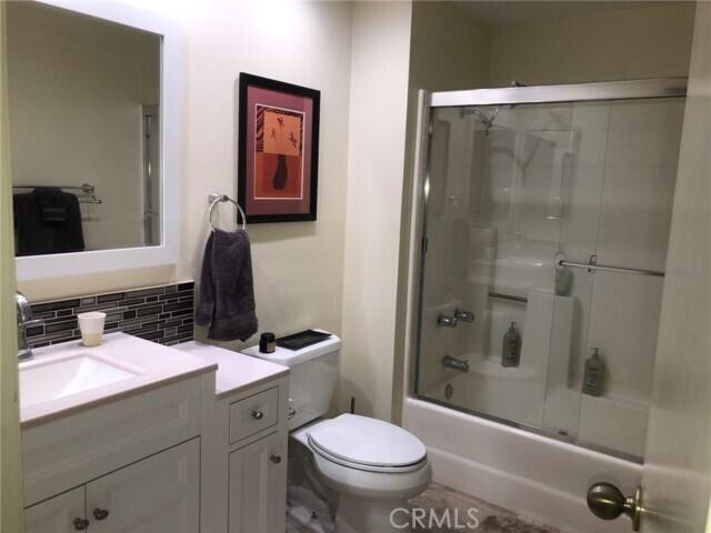 2700 Lawrence Crossley Road, Unit 51 Palm Springs, CA 92264 - Photo 12 of 23 a bathroom with a sink toilet and shower