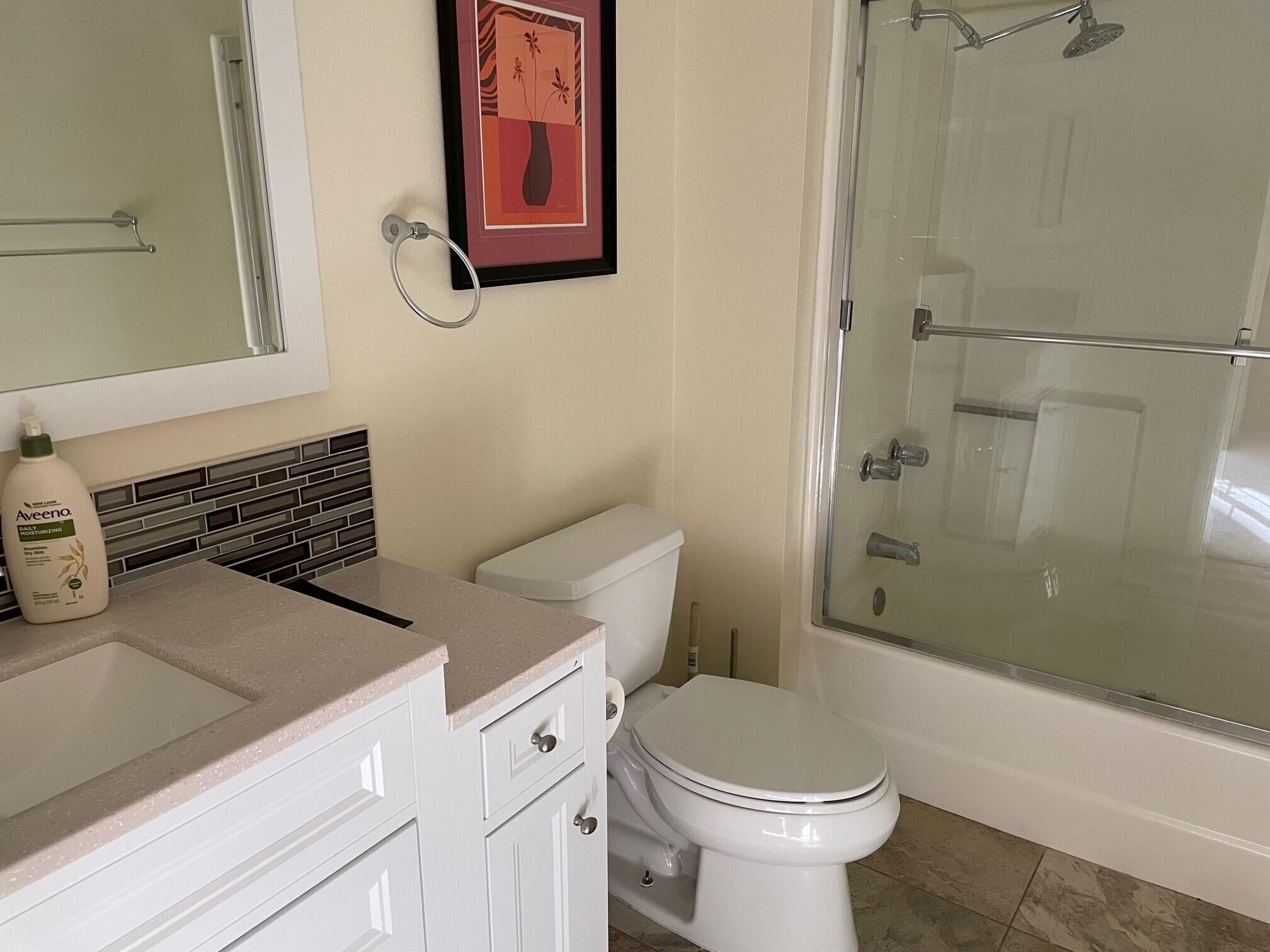2700 Lawrence Crossley Road, Unit 51 Palm Springs, CA 92264 - Photo 13 of 23 a bathroom with a toilet a sink and a shower