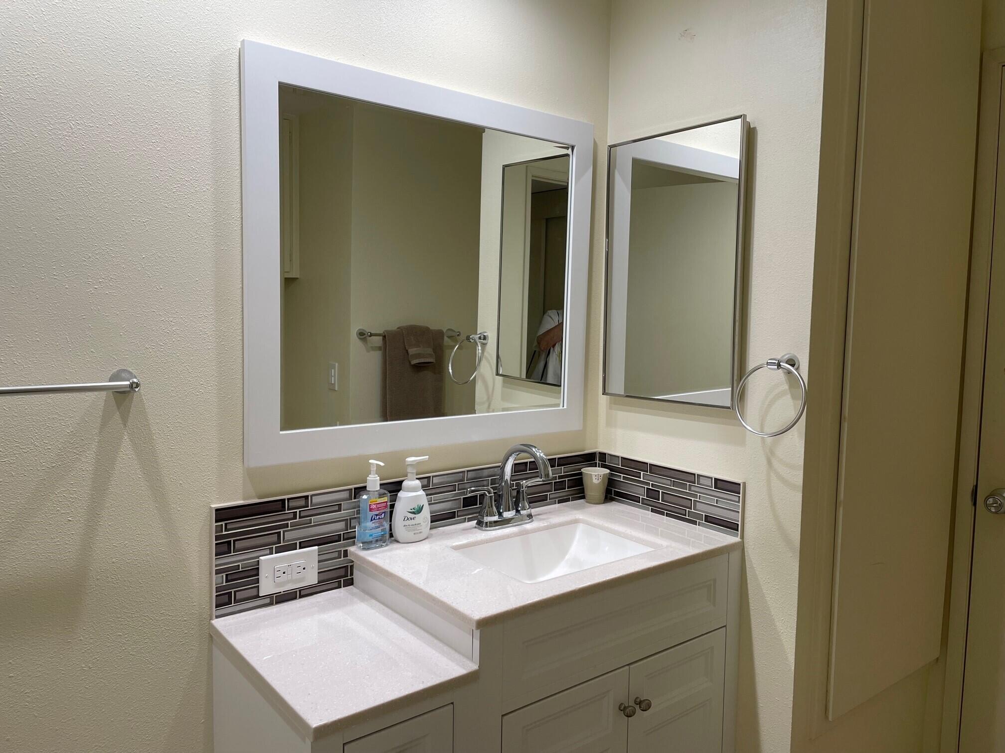 2700 Lawrence Crossley Road, Unit 51 Palm Springs, CA 92264 - Photo 16 of 23 a bathroom with a sink and a mirror