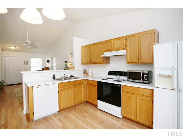5615 Marthonna Way Raleigh, NC 27616 - Photo 3 of 23 Bright! Kitchen is right off the back patio, great set up for grilling!