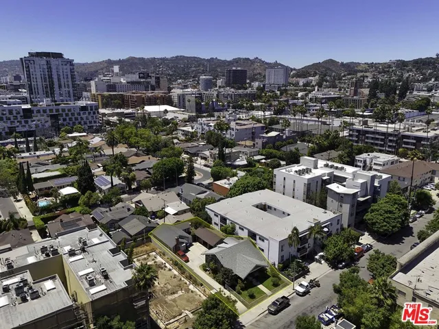 an aerial view of a city with lots of residential buildings