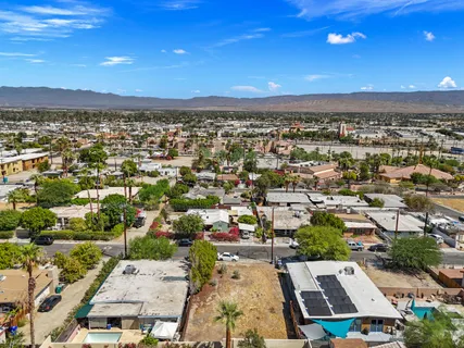 an aerial view of residential building with outdoor space