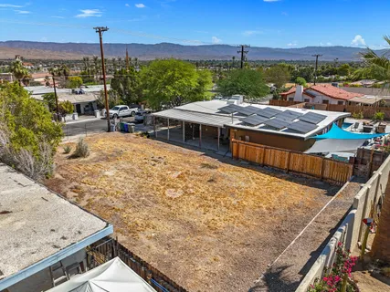 a view of a terrace with sitting area
