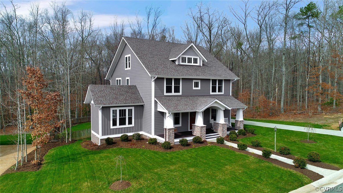 15930 Alsdell Road Midlothian, VA 23112 - Photo 3 of 50 a front view of a house with yard and green space