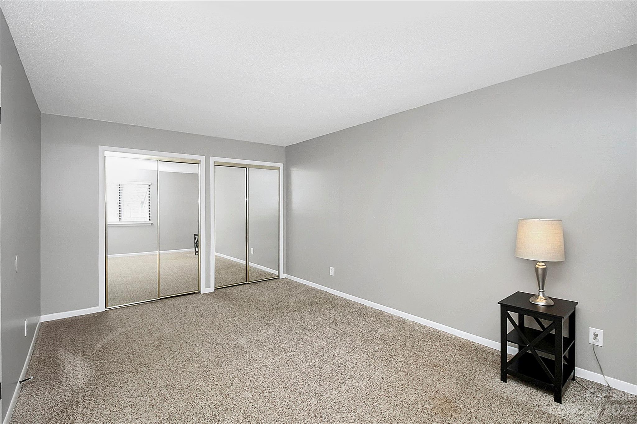 6144 Heath Ridge Court, Unit C Charlotte, NC 28210 - Photo 29 of 36 a view of an empty room and a window