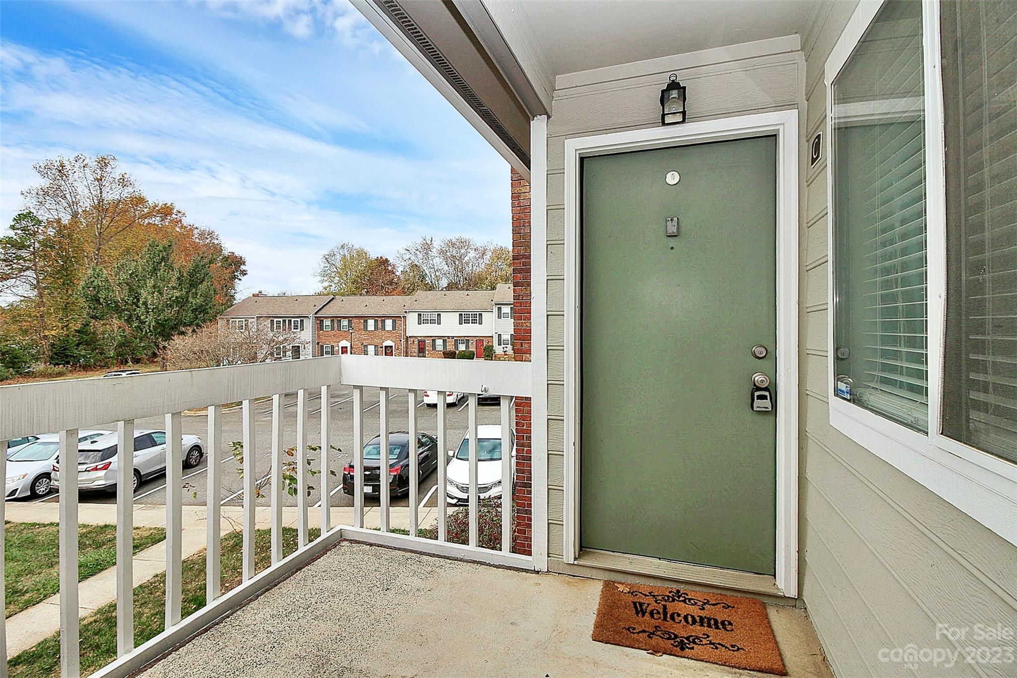 6144 Heath Ridge Court, Unit C Charlotte, NC 28210 - Photo 5 of 36 a view of a shop in the city street