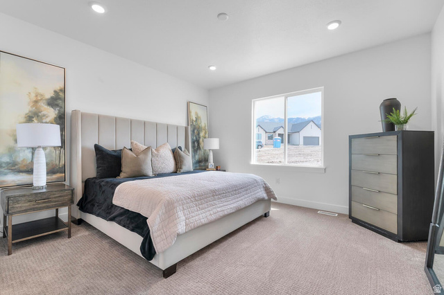 342 North Rhyolite Drive, Unit 88 Hurricane, UT 84737 - Photo 12 of 26 Spacious room featuring neutral carpeting, recessed ceiling lighting, and a large window with white trim