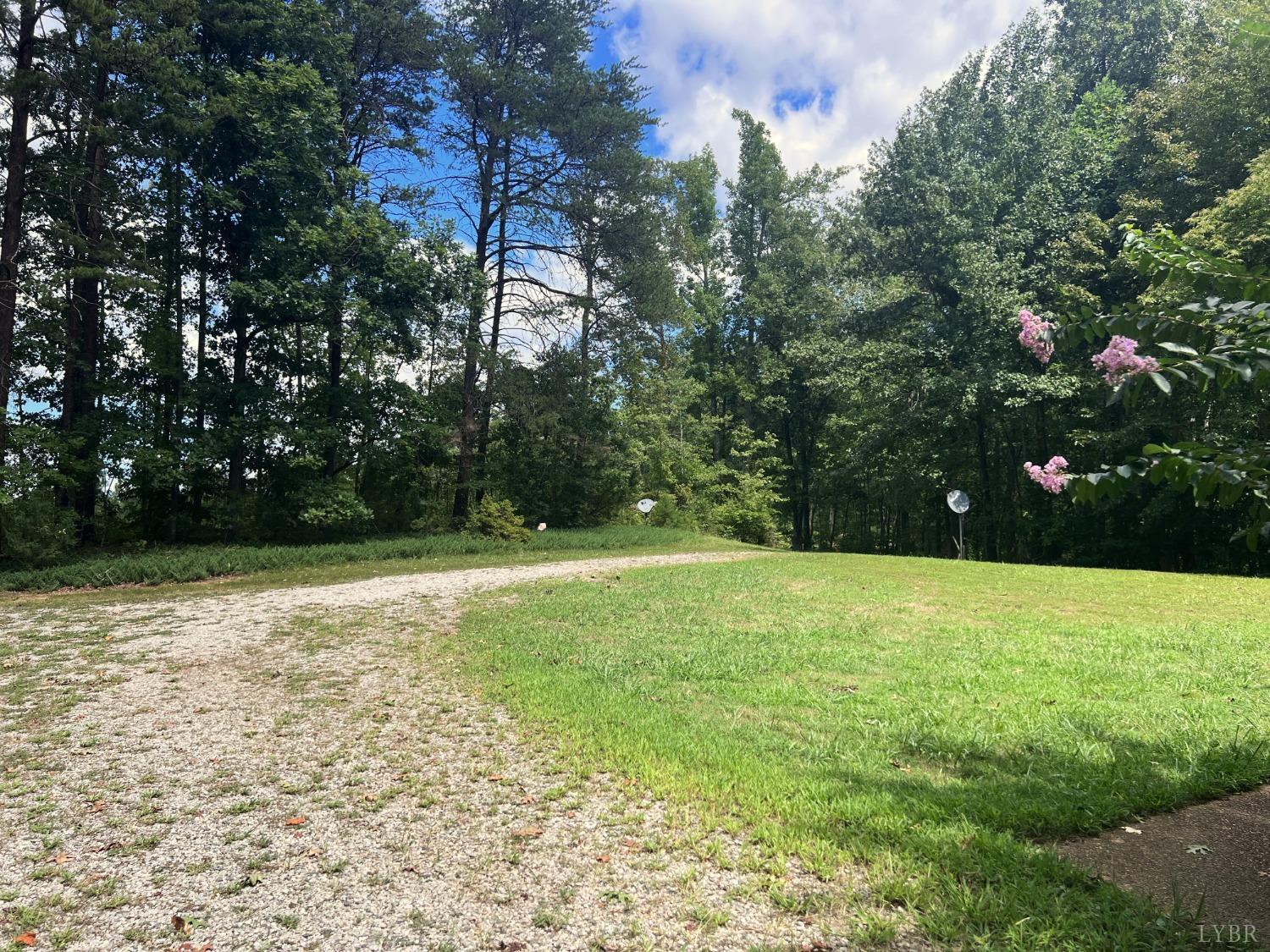 2444 Whitehead Road Keysville, VA 23947 - Photo 34 of 35 a backyard of a house with lots of green space