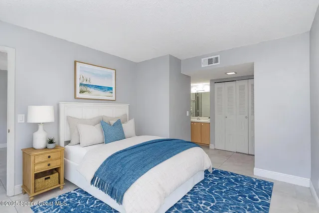 a bathroom with a double vanity sink and mirror