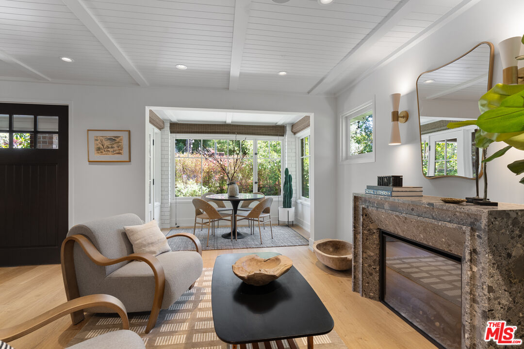 929 Marco Place Venice, CA 90291 - Photo 19 of 56 a living room with furniture and a large window