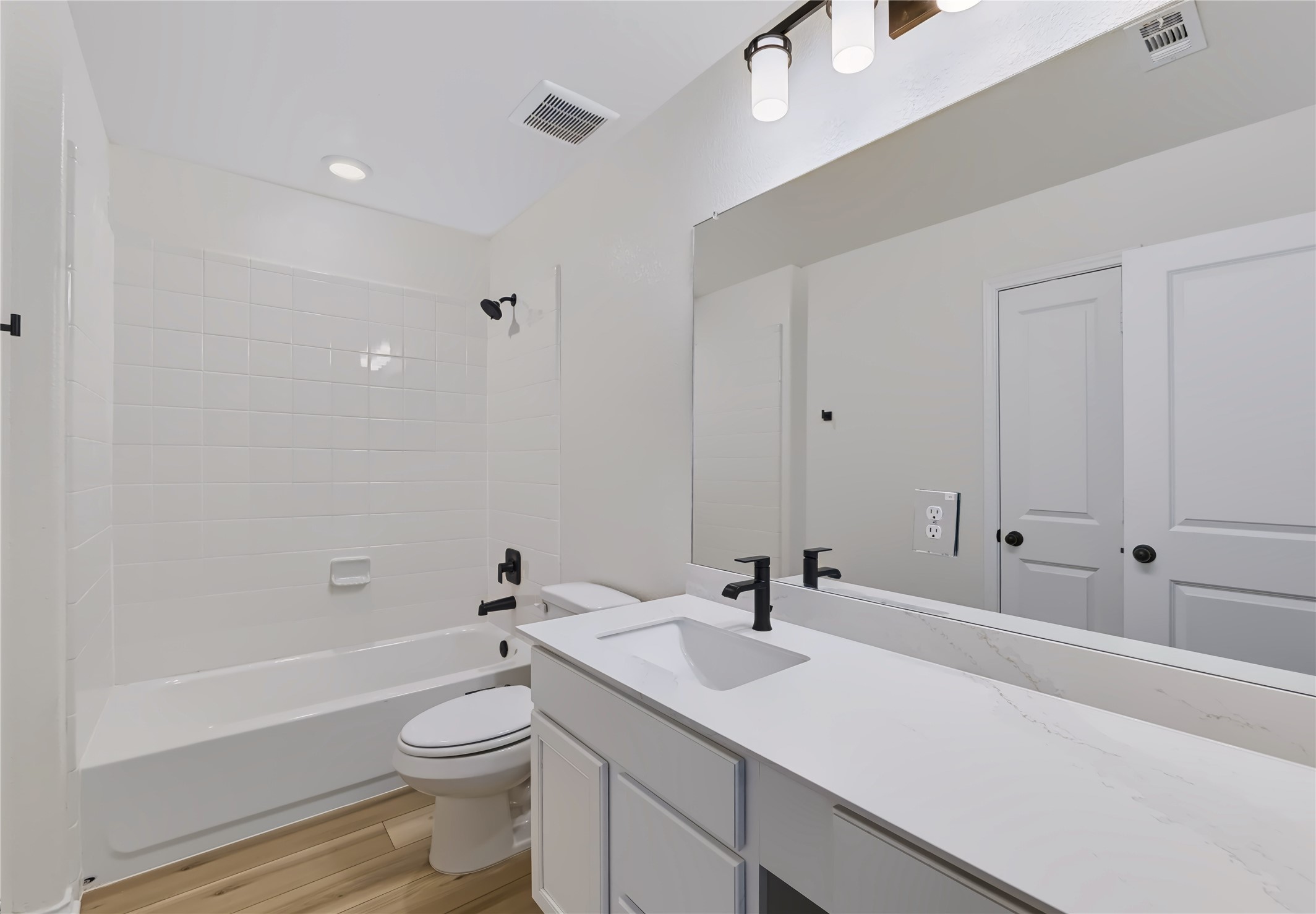 4600 Alfano Loop Round Rock, TX 78665 - Photo 24 of 34 33. Secondary bathroom featuring a vanity, tub-and-shower combination, and clean neutral finishes.