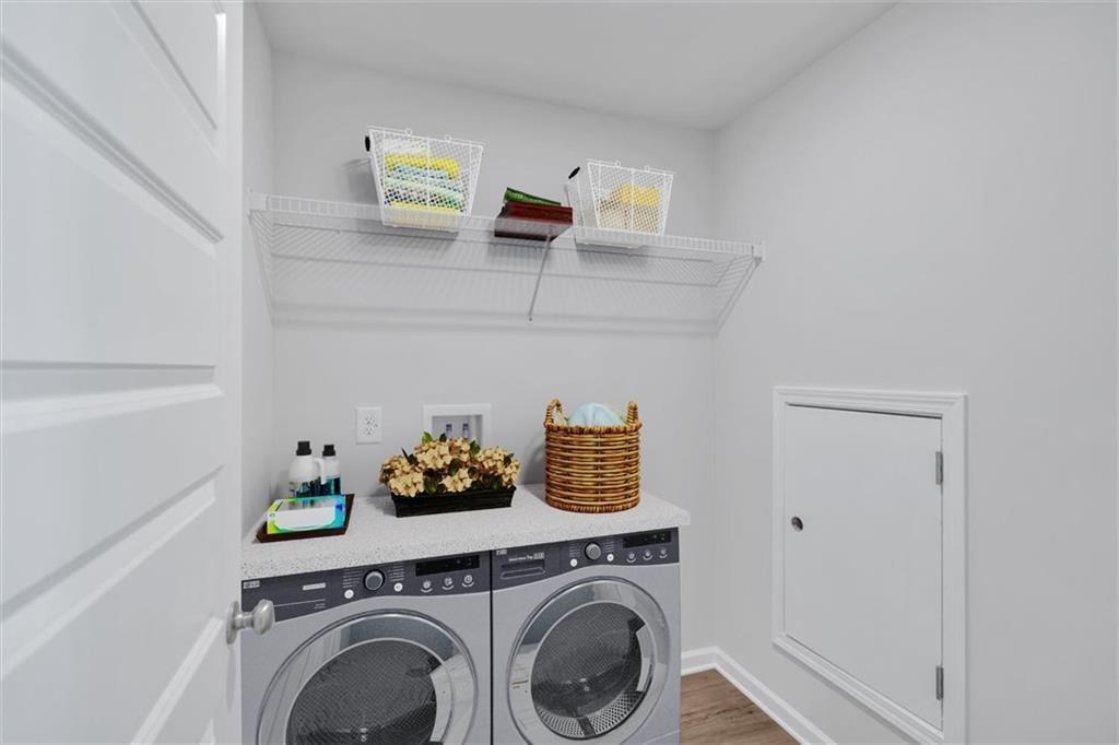 107 Lavender Circle Calhoun, GA 30701 - Photo 16 of 32 a view of storage and utility room with washer and dryer