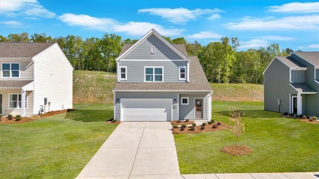 107 Lavender Circle Calhoun, GA 30701 - Photo 2 of 32 a front view of a house with a yard