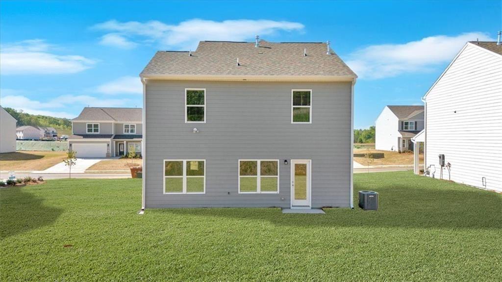 107 Lavender Circle Calhoun, GA 30701 - Photo 24 of 32 a front view of a house with a yard