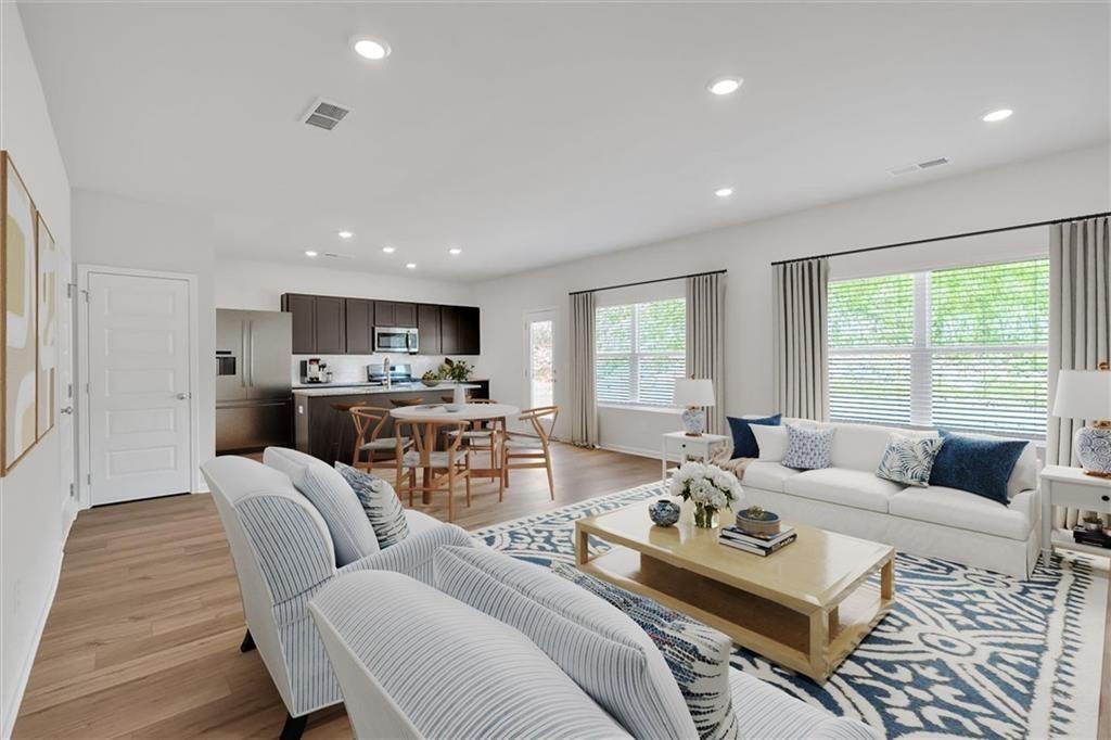 107 Lavender Circle Calhoun, GA 30701 - Photo 7 of 32 a living room with furniture and a large window