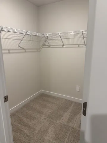 a view of a room with racks on the wall