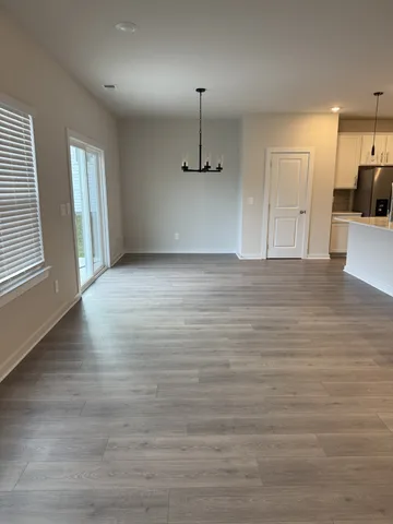 a view of a kitchen with a dishwasher and a window