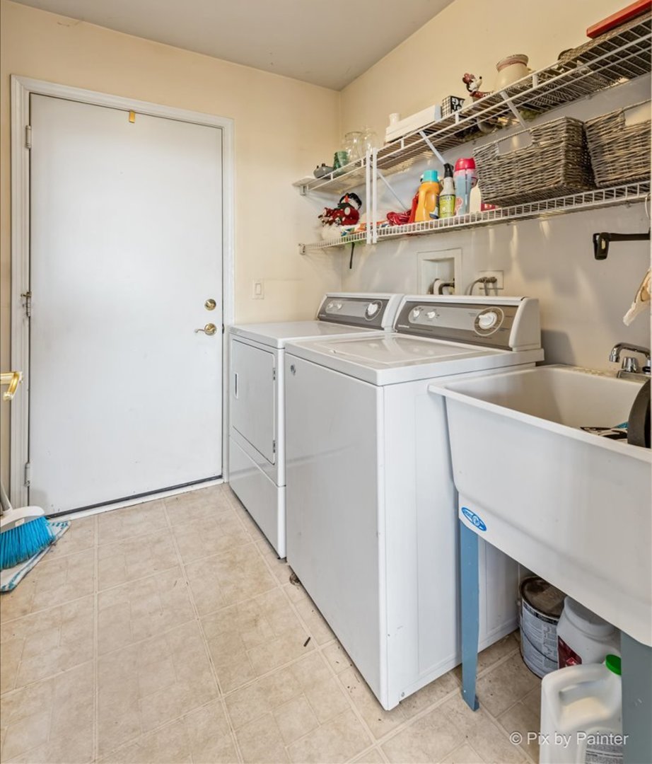 17228 Como Avenue Lockport, IL 60441 - Photo 13 of 32 a storage room with washer and dryer