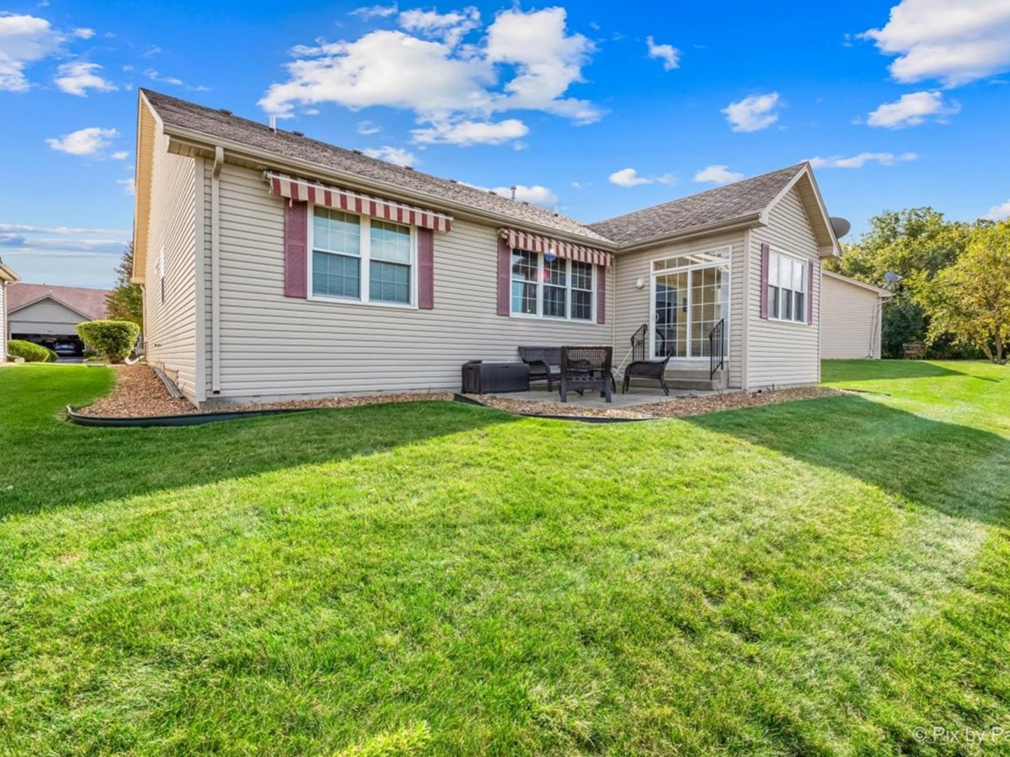 17228 Como Avenue Lockport, IL 60441 - Photo 22 of 32 a house view with a sitting space and garden