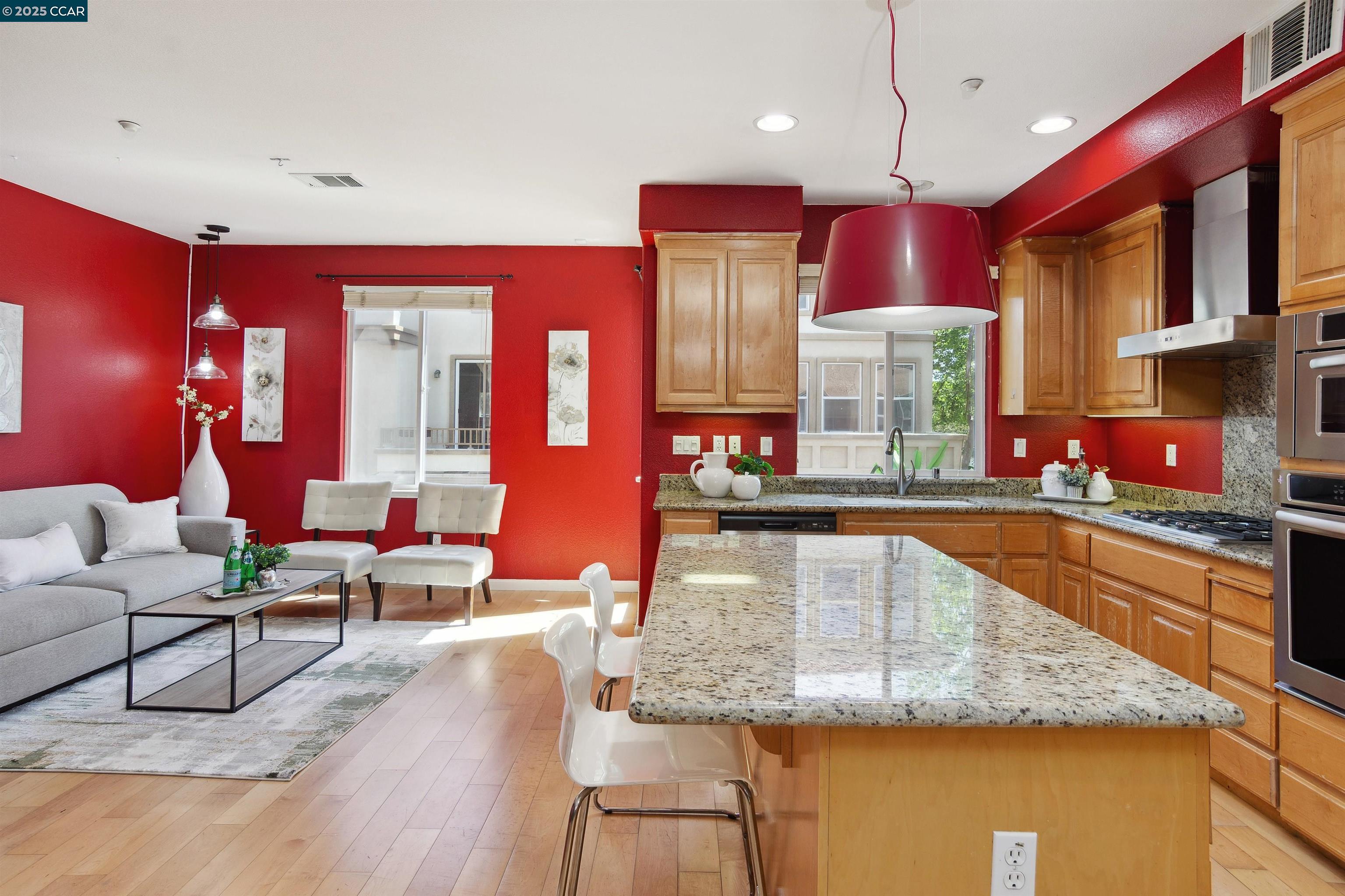 2073 Watermill Road San Ramon, CA 94582 - Photo 15 of 46 a large kitchen with stainless steel appliances granite countertop a barbecue grill and a refrigerator