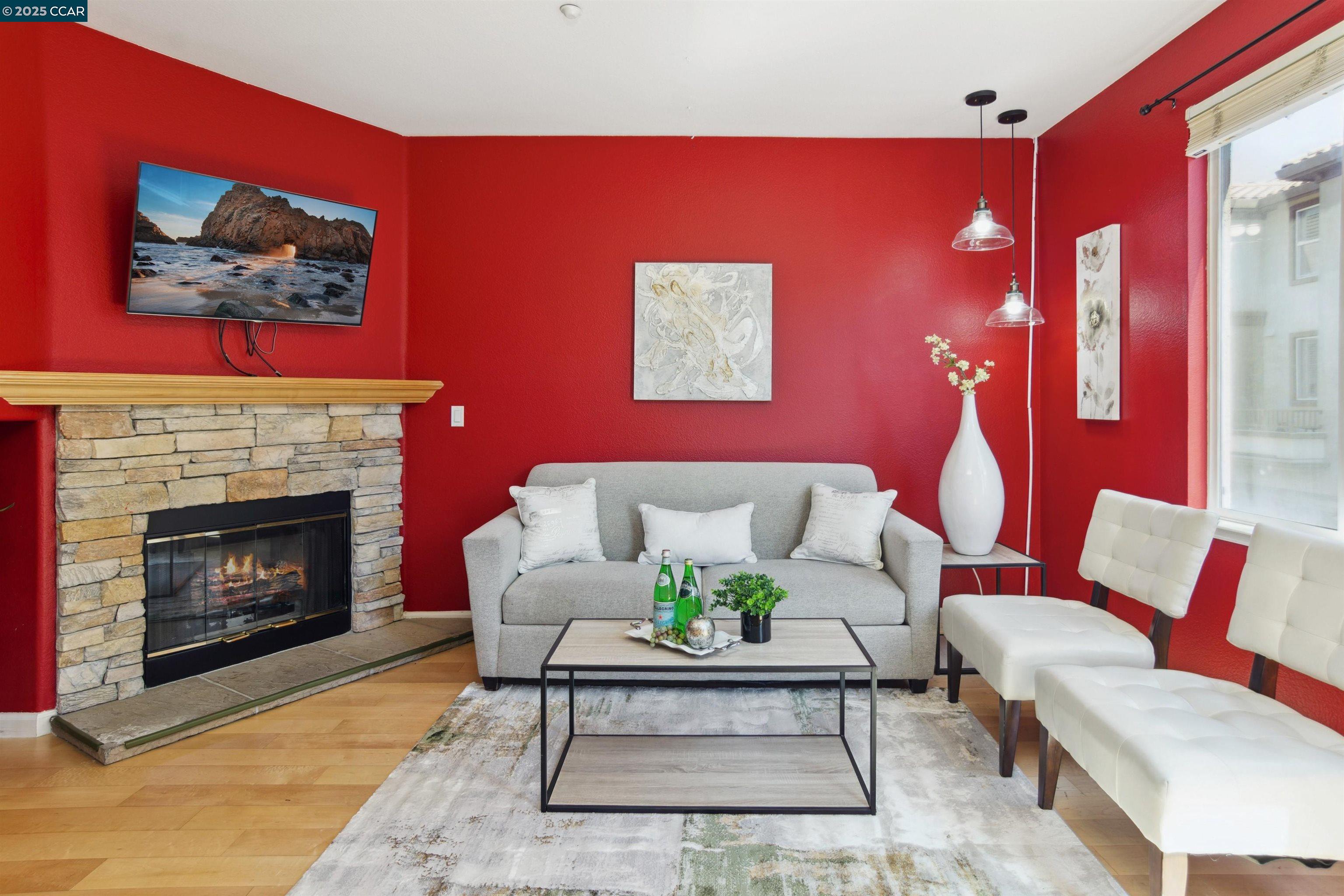 2073 Watermill Road San Ramon, CA 94582 - Photo 17 of 46 a living room with furniture and a fireplace