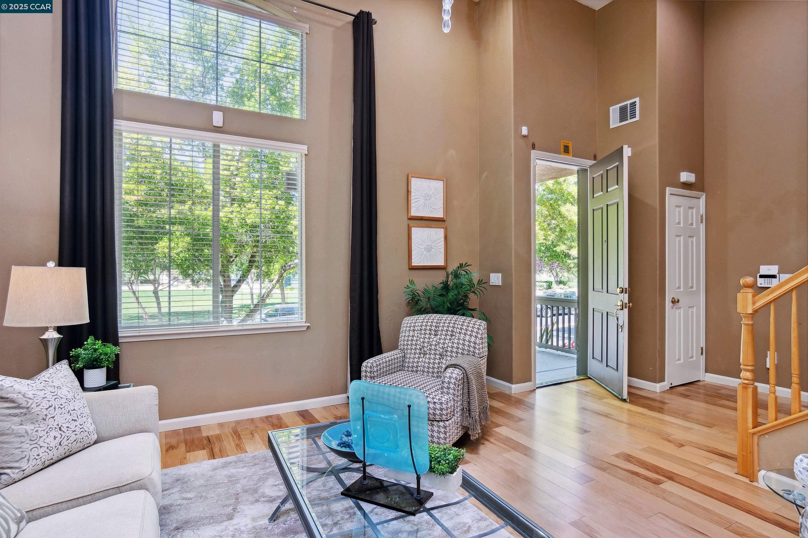 2073 Watermill Road San Ramon, CA 94582 - Photo 9 of 46 a living room with furniture and a large window