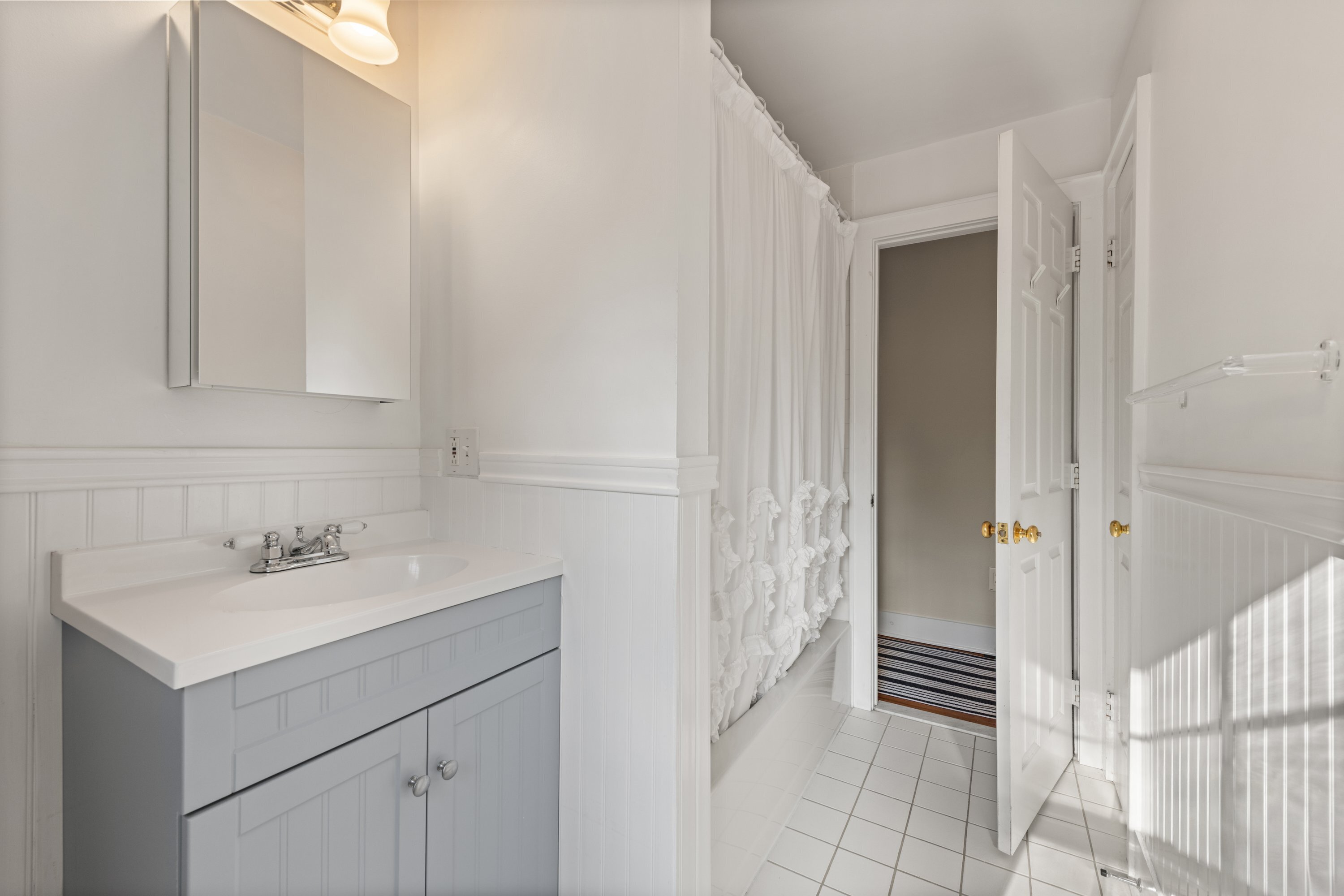 21 Wright Street Westport, CT 06880 - Photo 17 of 24 a bathroom with a sink and a mirror