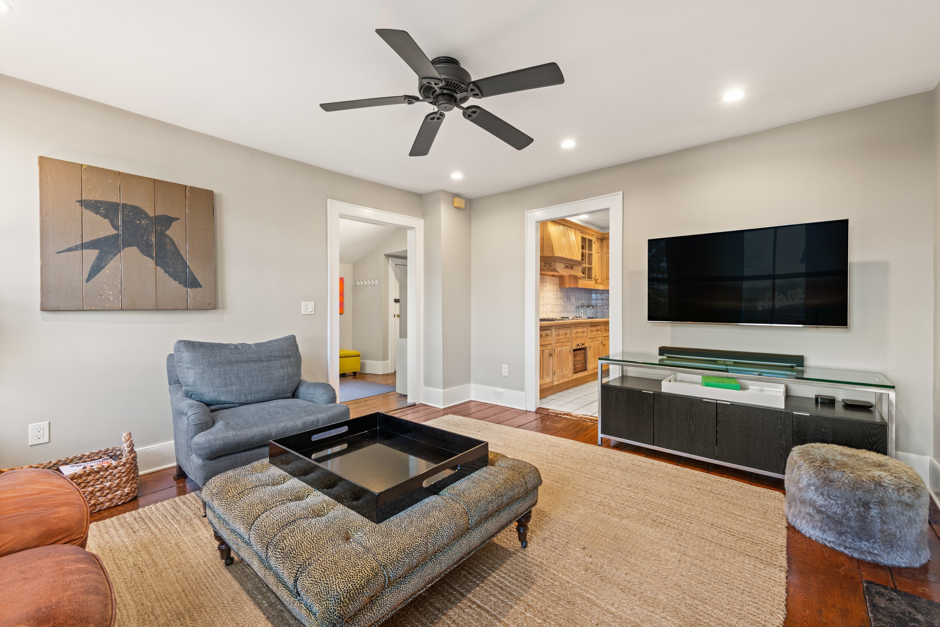 21 Wright Street Westport, CT 06880 - Photo 8 of 24 a living room with furniture and a flat screen tv