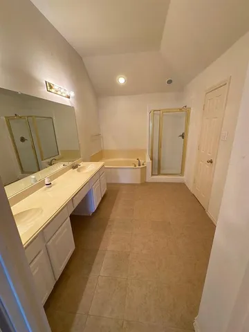 a room with water heater and a sink