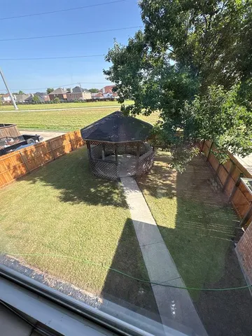 a view of swimming pool from a balcony