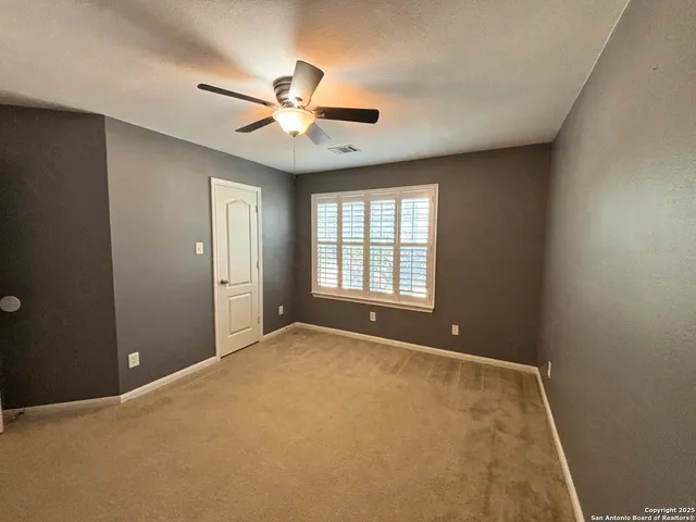 a bathroom with a toilet and a bathtub