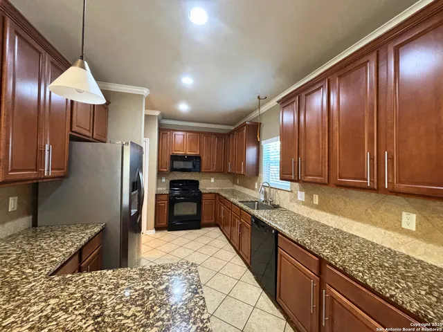 a view of closet area with empty racks