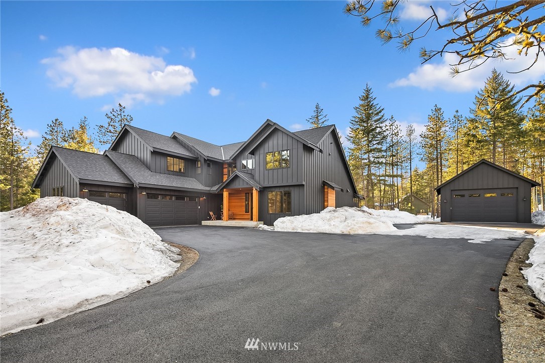 651 Bakers Road Ronald, WA 98940 - Photo 1 of 39 a front view of a house with a yard