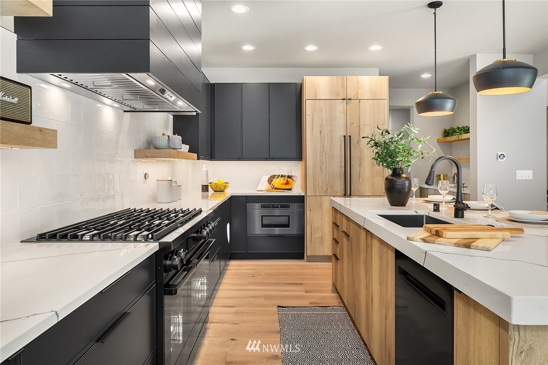 651 Bakers Road Ronald, WA 98940 - Photo 11 of 39 a kitchen with stainless steel appliances granite countertop a stove a sink and a refrigerator