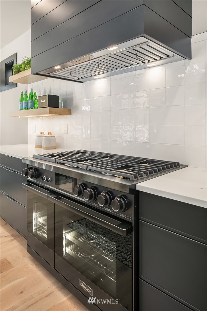 651 Bakers Road Ronald, WA 98940 - Photo 13 of 39 a stove top oven sitting inside of a kitchen