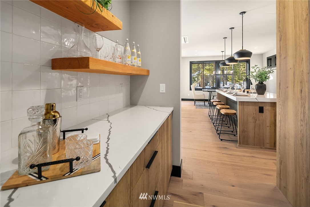 651 Bakers Road Ronald, WA 98940 - Photo 14 of 39 a kitchen with a sink a stove and a wooden floor